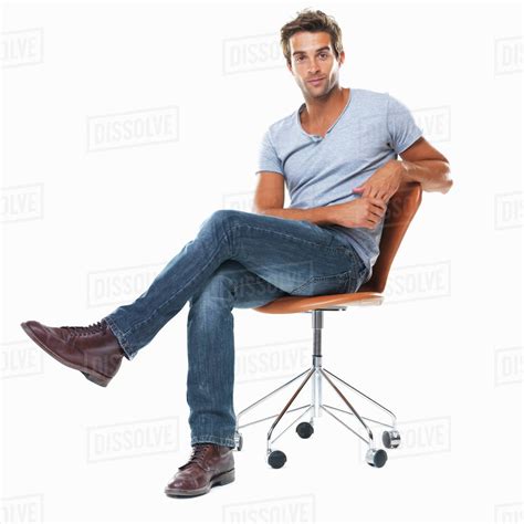 a man sitting on a chair